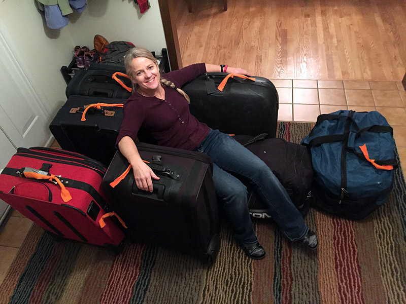 Beth takes a break on more than 300lbs of gear.
